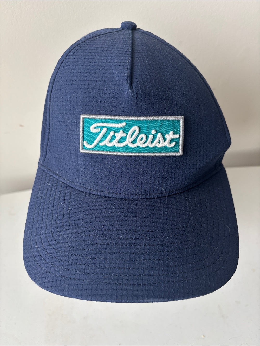 Titleist SnapBack Navy Cap with Teal Patch Logo